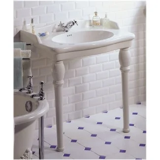 Here's the translation:Louxor white pedestal sink by Sarreguemines