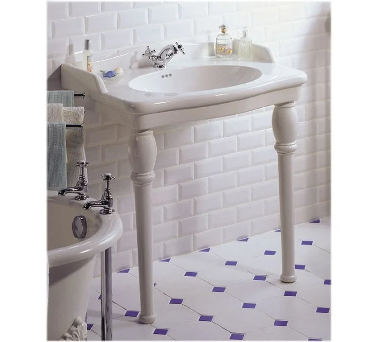 Here's the translation:Louxor white pedestal sink by Sarreguemines