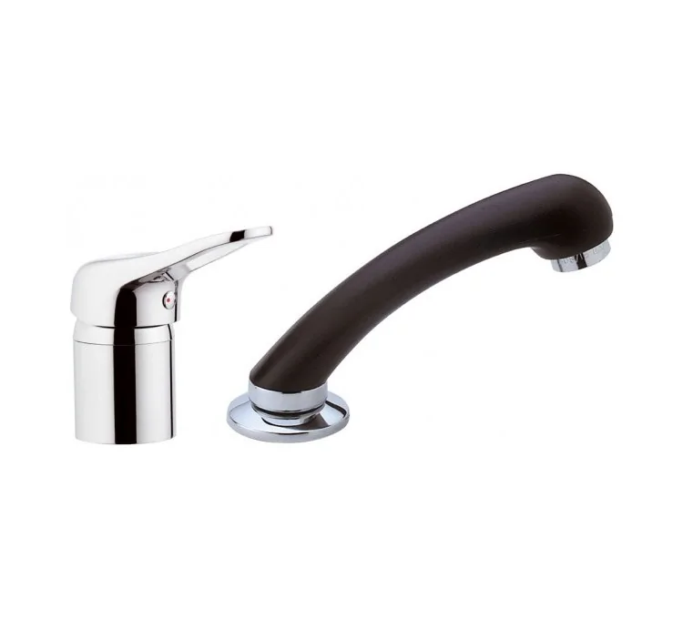 Hairdresser's mixer tap with hand shower on table and flexible hose